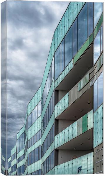 Malmo University Building with a Moody Sky Canvas Print by Antony McAulay