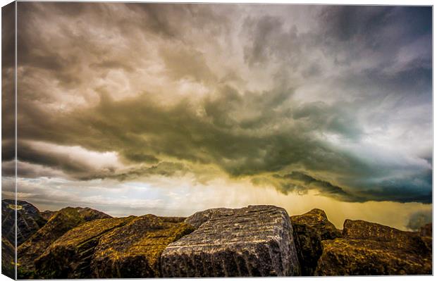  Storm over Sea Defences Canvas Print by jon  Roberts