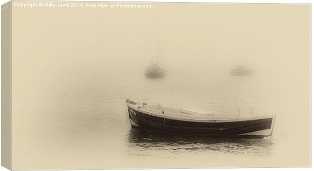 Misty Boats Canvas Print by Mike Janik