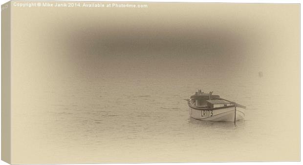 Misty Boat Canvas Print by Mike Janik