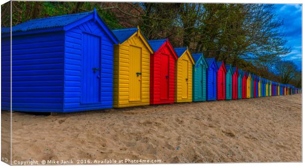 Beach Huts Canvas Print by Mike Janik