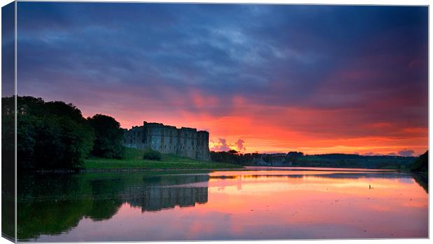 Carew Castle Sunset Canvas Print by Mark Robson
