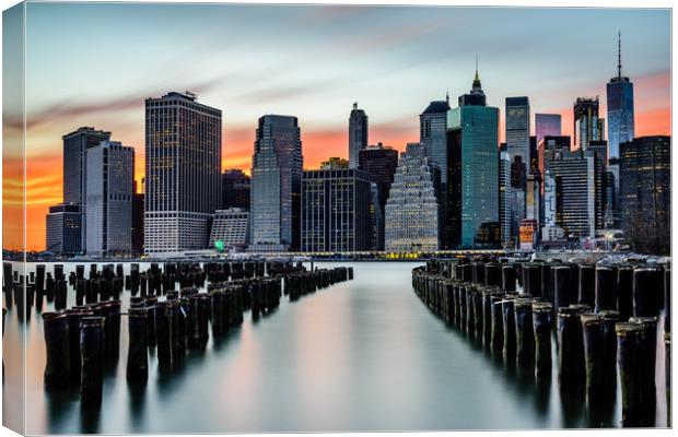 New York Sunset Over The Manhattan Skyline Canvas Print by Chris Curry