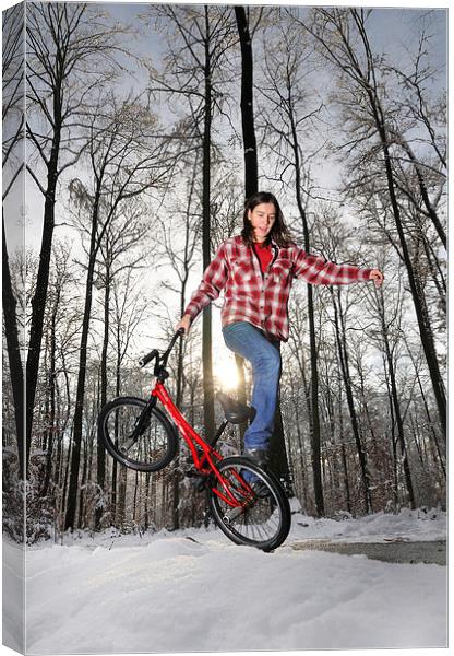 BMX Flatland rider in winter Canvas Print by Matthias Hauser