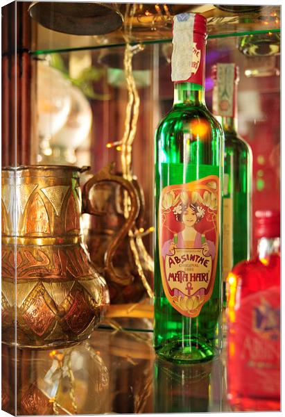 Bottle with green absinthe Canvas Print by Matthias Hauser