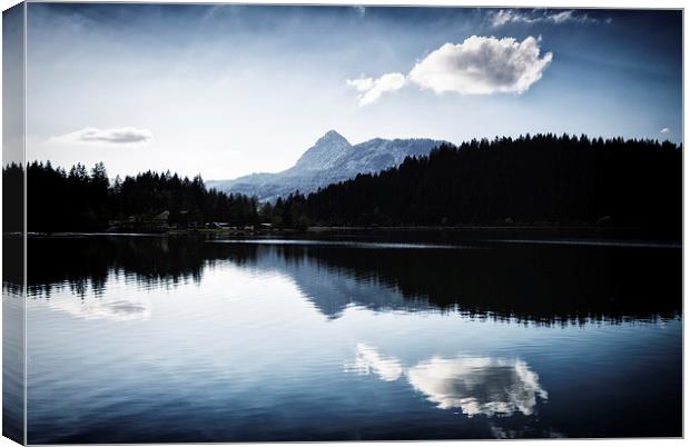 Water reflection black and blue Canvas Print by Matthias Hauser