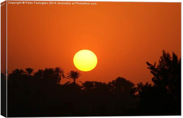 Sunset over the Nile Canvas Print by Peter Farrington