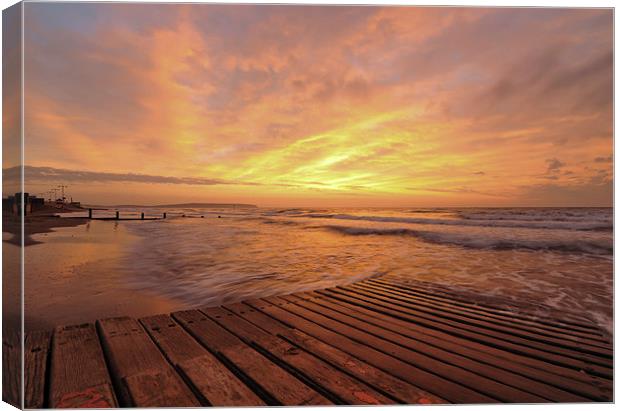  Sunrise over a jetty  Canvas Print by Shaun Jacobs