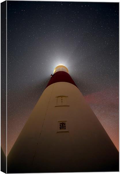 Portland Bill lighthouse at night Canvas Print by Shaun Jacobs