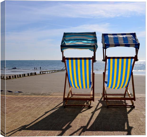 Deck chairs on the beach  Canvas Print by Shaun Jacobs