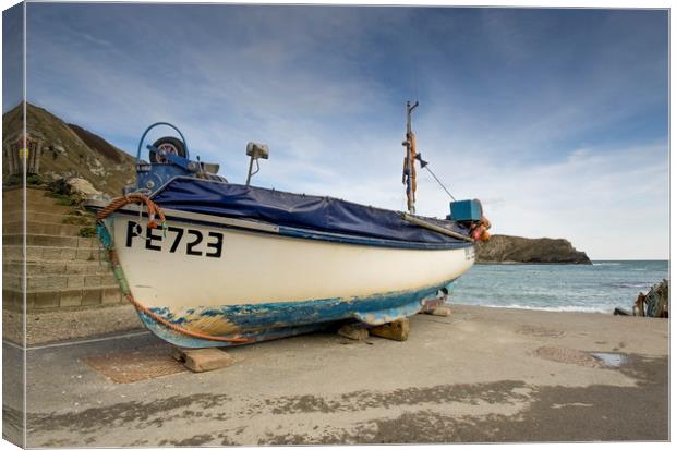 Lulworth cove fishing boat  Canvas Print by Shaun Jacobs