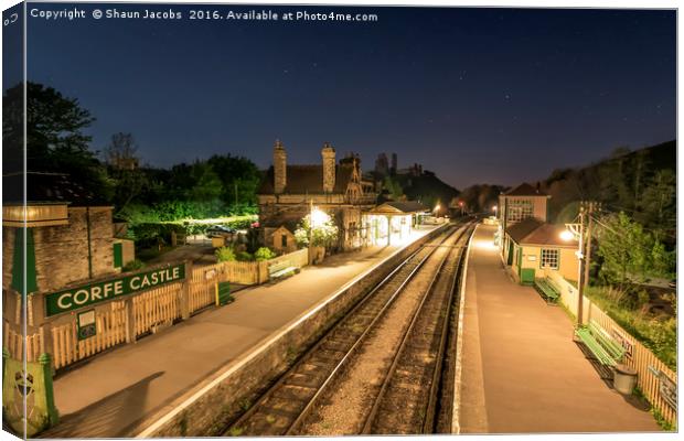 Corfe castle train station by night  Canvas Print by Shaun Jacobs