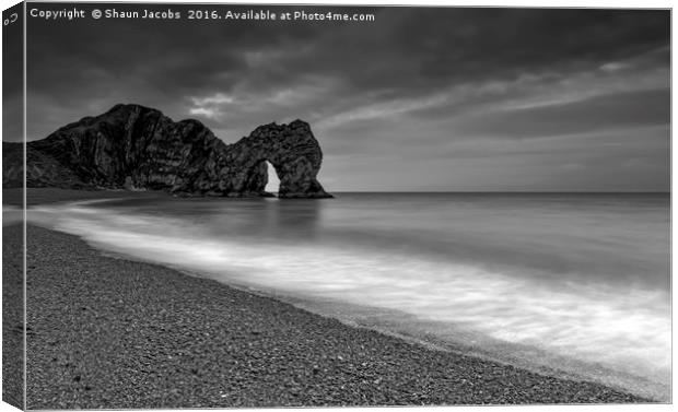 Durdle Door stormy morning  Canvas Print by Shaun Jacobs