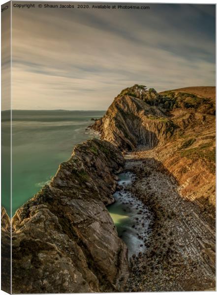 Sunset over Stair Hole In Lulworth Dorset  Canvas Print by Shaun Jacobs