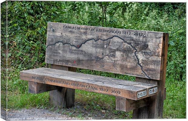 bench aside the mon and brec canal Canvas Print by keith hannant