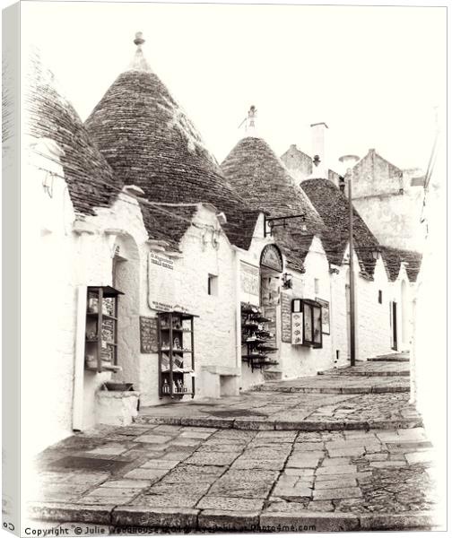 Alberobello Canvas Print by Julie Woodhouse