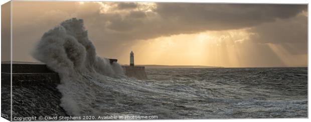 Porthcawl lighthouse in a storm Canvas Print by David Stephens