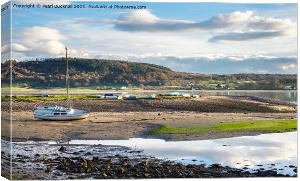 Boats in Red Wharf Bay Anglesey Canvas Print by Pearl Bucknall