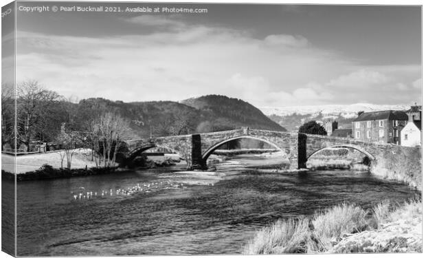 Llanrwst Bridge and Conwy River in Black and White Canvas Print by Pearl Bucknall