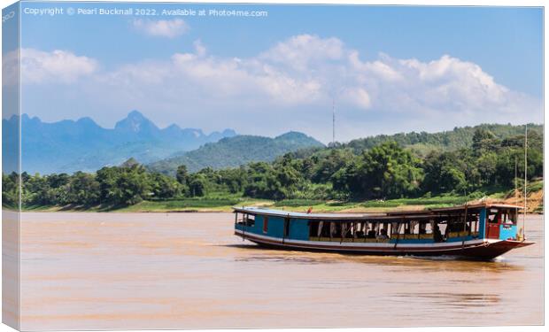 Sailing on the Mekong River Laos Canvas Print by Pearl Bucknall