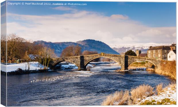 Llanrwst Bridge and Conwy River in Winter Canvas Print by Pearl Bucknall