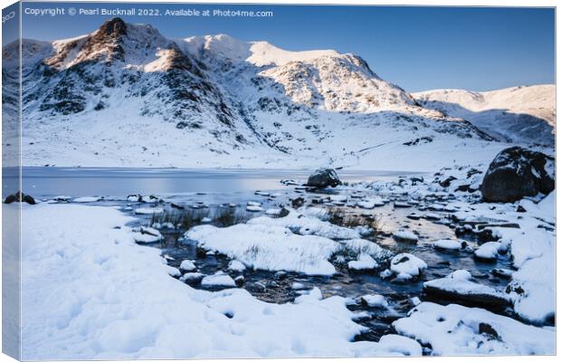 Frozen Llyn Idwal in Winter Snow Snowdonia Canvas Print by Pearl Bucknall