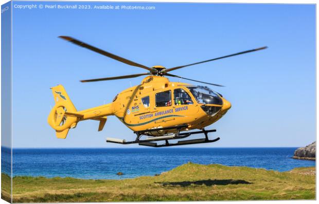 Scottish Ambulance Helicopter Lifting Off Canvas Print by Pearl Bucknall