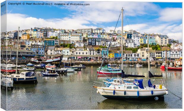 Boats in Colourful Brixham Harbour Canvas Print by Pearl Bucknall