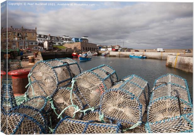 Lobster Pots in Seahouses Harbour Northumberland Canvas Print by Pearl Bucknall