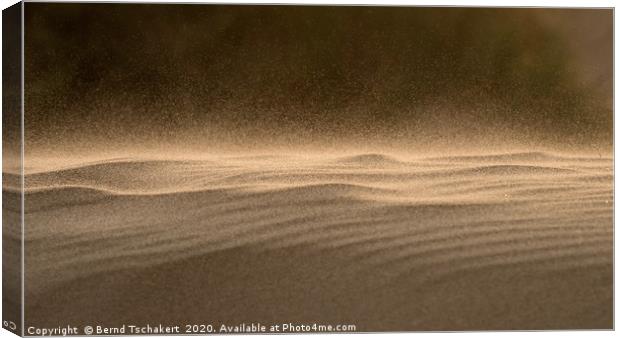 Strong wind blowing sand across dune, Rhossili, UK Canvas Print by Bernd Tschakert