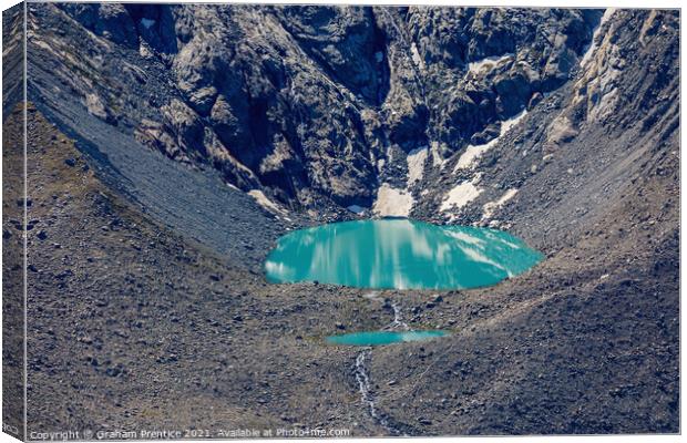 Moraine Glacial Lake, Switzerland Canvas Print by Graham Prentice