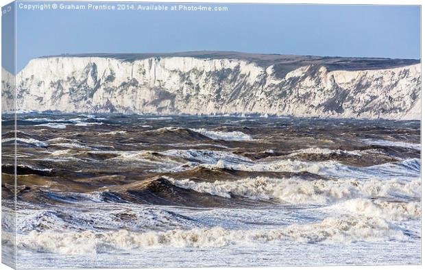 Stormy Sea And White Cliffs Canvas Print by Graham Prentice