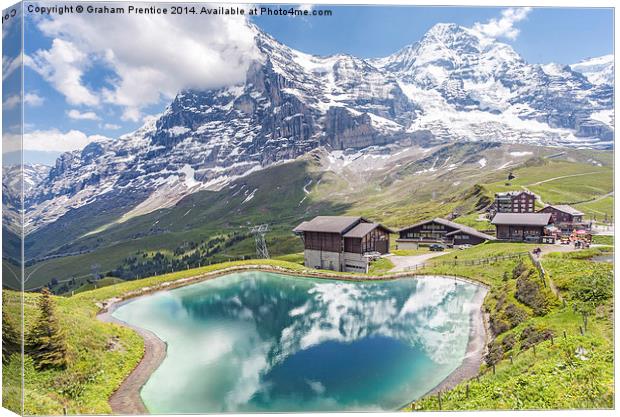 Eiger and Reflection in Alpine Lake Canvas Print by Graham Prentice