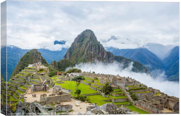 Machu Picchu Ruins Canvas Print by Graham Prentice