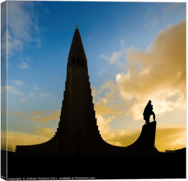 Hallgrímskirkja and Leif Erikson Statue, at Sunset Canvas Print by Graham Prentice