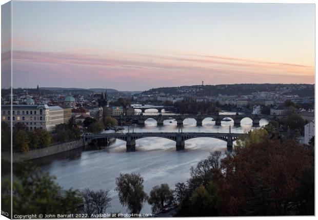 Prague Bridges at Sunset Canvas Print by John Barratt