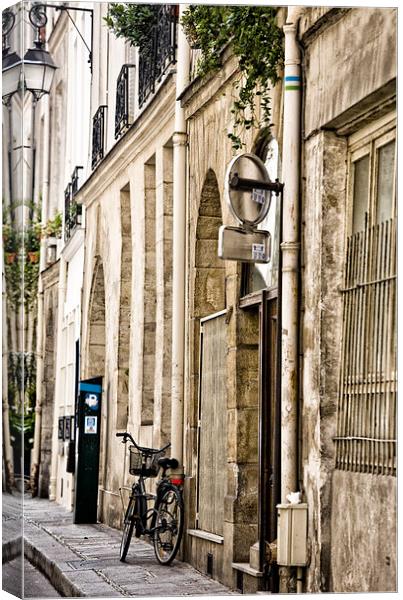 Bicycle in Paris street Canvas Print by Sheila Smart