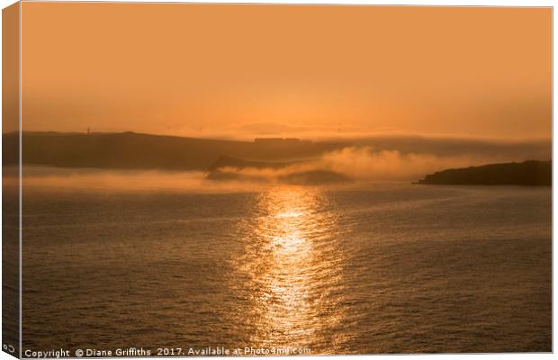 Misty Sunrise over Newquay Canvas Print by Diane Griffiths