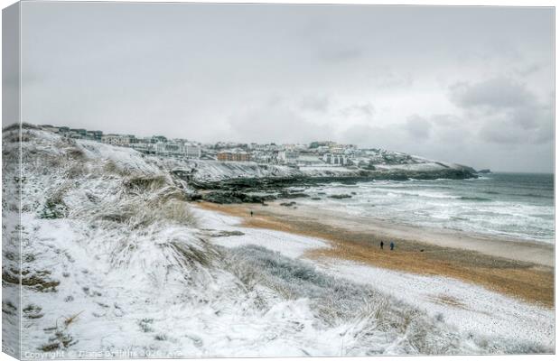 Fistral Beach towards Pentire under snow Canvas Print by Diane Griffiths