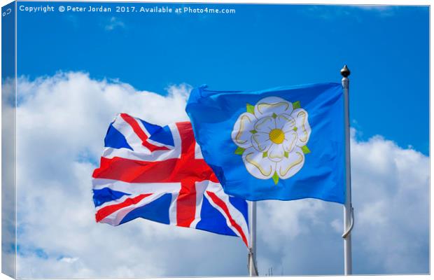 The United Kingdom and  Yorkshire Flags  flying si Canvas Print by Peter Jordan