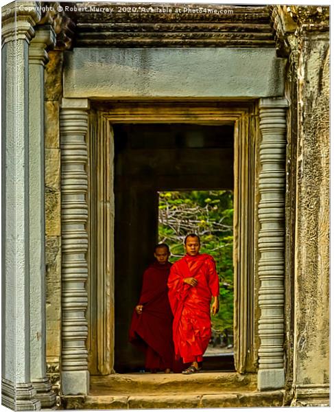 Buddhist Monk and Acolyte, Angkor Wat, Cambodia. Canvas Print by Robert Murray