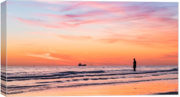 Iron Man watching a boat go out into the Irish Sea Canvas Print by Jason Wells