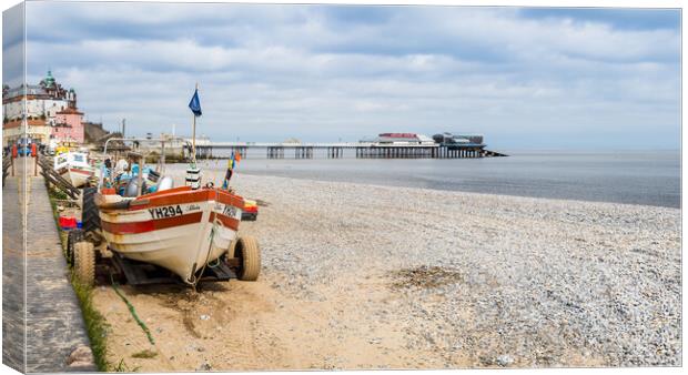 Tractors line the edge of Cromer beach Canvas Print by Jason Wells