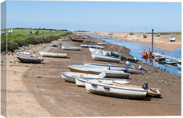 Boats on the channel into Wells next the Sea quay Canvas Print by Jason Wells