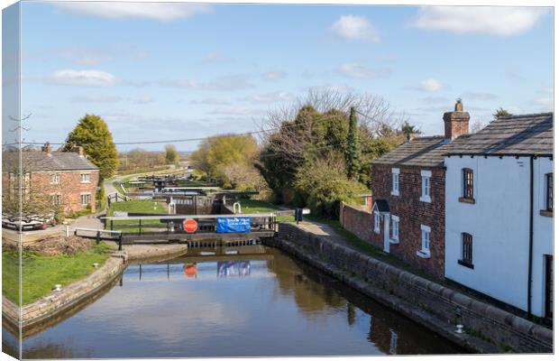 Locks on the Rufford branch of the Leeds Liverpool canal Canvas Print by Jason Wells