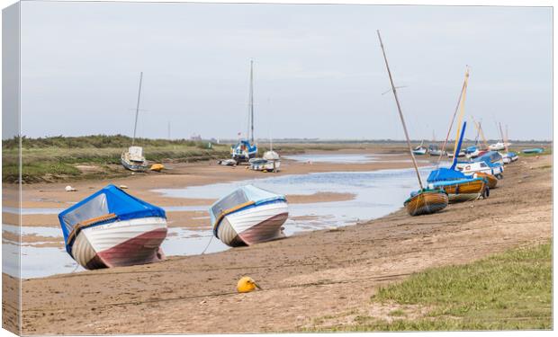 Boats beached at Blakeney Canvas Print by Jason Wells