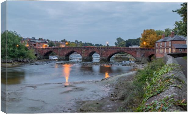 Red light streaks over the Old Dee Bridge Canvas Print by Jason Wells