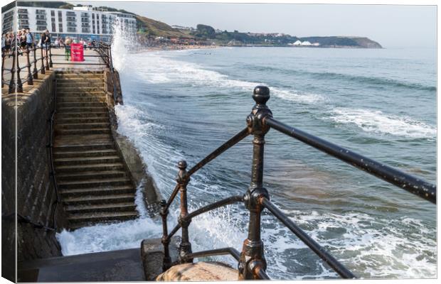 Waves crash into the steps and promenade Canvas Print by Jason Wells