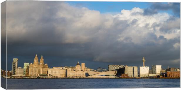 Liverpool waterfront under a cloudy sky Canvas Print by Jason Wells