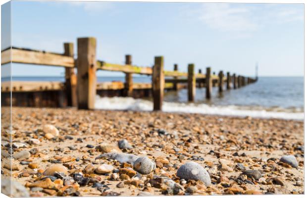 Pebbles on Happisburgh beach Canvas Print by Jason Wells